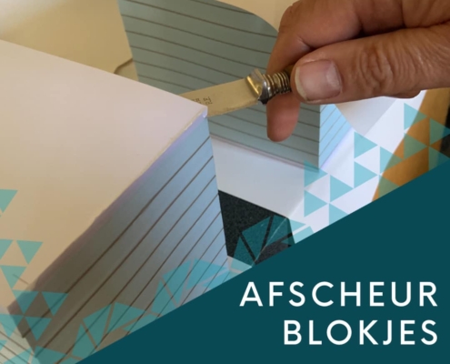 afscheurblokje print zwart gelijmd onderkarton